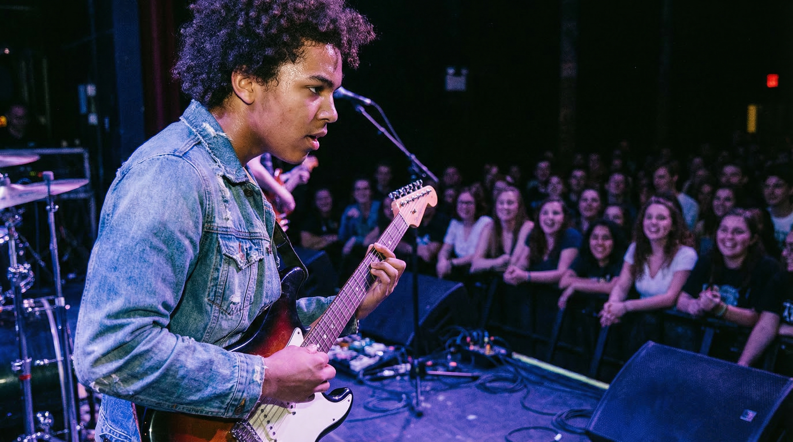 Teenager with clear, healthy skin smiling confidently